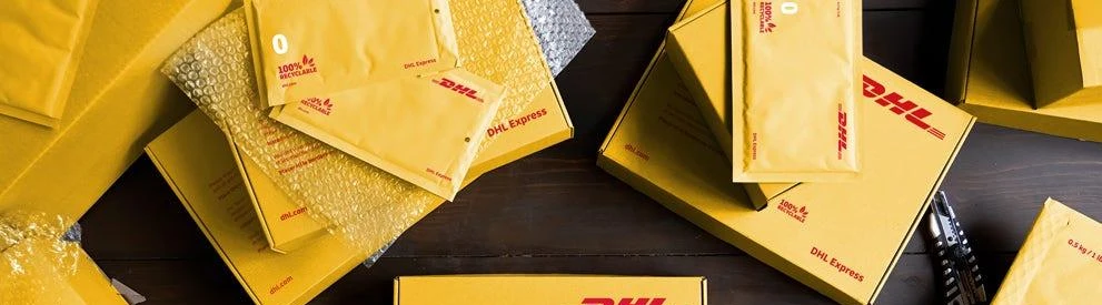 DHL Express yellow envelopes and shipping cartons