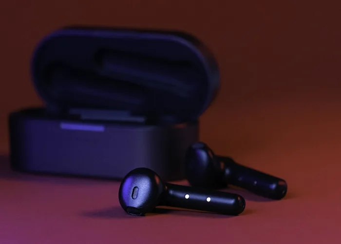 Wireless earbuds with their charging case